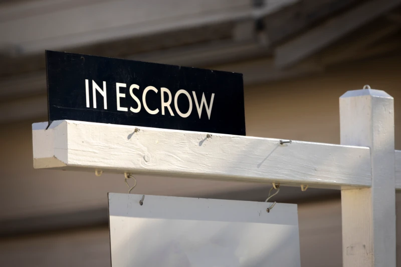 Home 36 In escrow sign