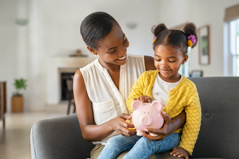 Home 29 Mom and daughter saving money