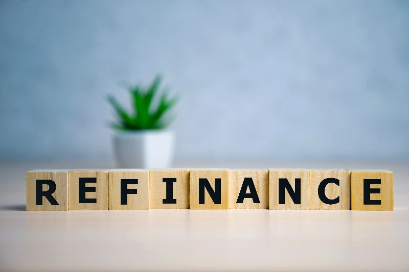 Home 19 Focus on wooden blocks with letters refinance