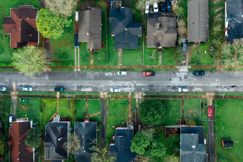 Home 13 Highangle aerial shot of a suburban neighborhood street line 1781024416