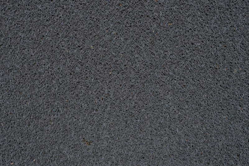 Home 10 Detailed view of a gray synthetic doormat showcasing its fib 1786467764